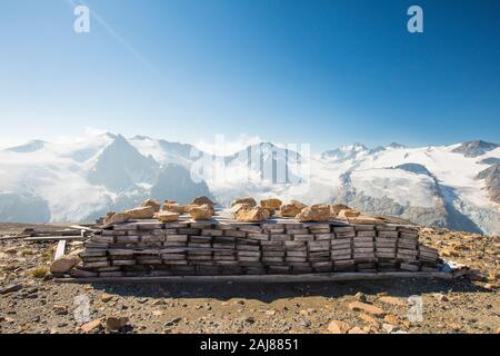 Pallet of mining core samples abandoned in mountains. Stock Photo