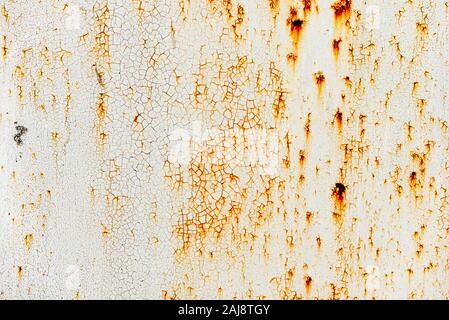 Metal texture with scratches and cracks which can be used as a background Stock Photo