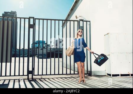 Stylish lady in blue dress Stock Photo