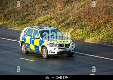 Tac ops, BMW X5 Xdrive30D AC Auto Police car.  Lancashire Tactical Operations division. UK Police Vehicular traffic, transport, modern, BMW saloon cars, east bound on the 3 lane M55 motorway highway. Stock Photo