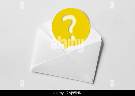 Email envelope with question mark speech bubble on white background Stock Photo