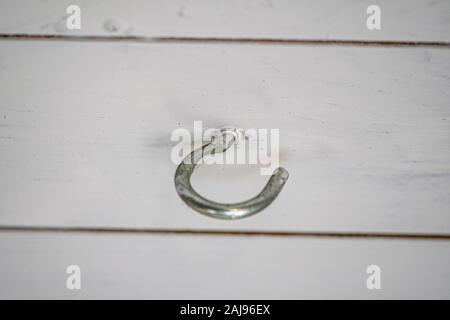 Hooks in the wall in the wooden ceiling Stock Photo