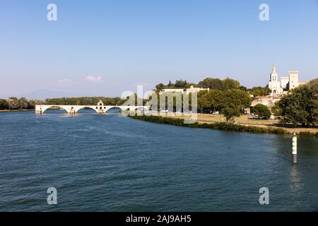 view of the Pont du Avignon over Rhone river - Palais des papes and Notre dame des dome cathedral at Avignon - France Stock Photo
