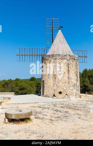 a view of the Moulin de Daudet in Fontvieille / Provence (France). This windmill was the former home of famous French writer Alphonse Daudet. Stock Photo