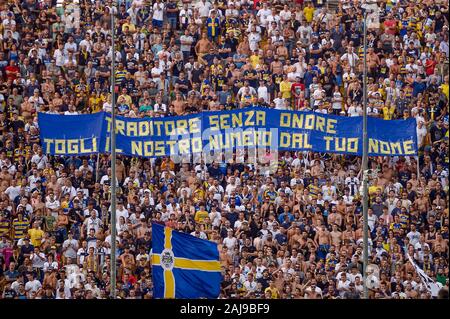 Parma, Italy. 24 August, 2019: Fans of Parma Calcio show a banner against Gianluigi Buffon of Juventus FC during the Serie A football match between Parma Calcio and Juventus FC. Juventus FC won 1-0 over Parma Calcio. Credit: Nicolò Campo/Alamy Live News Stock Photo