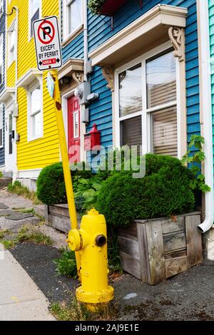 Fire hydrant outside of a house in St John's, Newfoundland and Labrador, Canada. Stock Photo