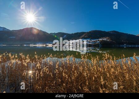 Sunny winter day at Lake Weissensee in Carinthia, Austria Stock Photo