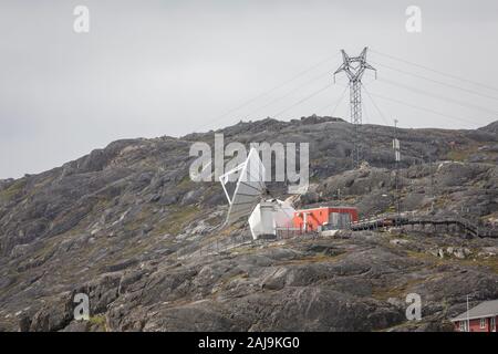 Satellite dish and pylon on hilltop near Qaqortoq, Greenland Stock Photo