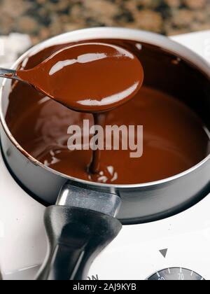 Chocolate making using a bain marie Stock Photo