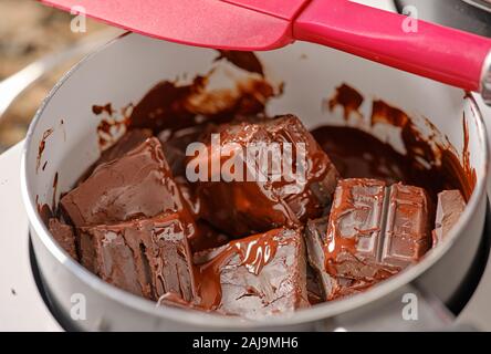 Chocolate making using a bain marie Stock Photo