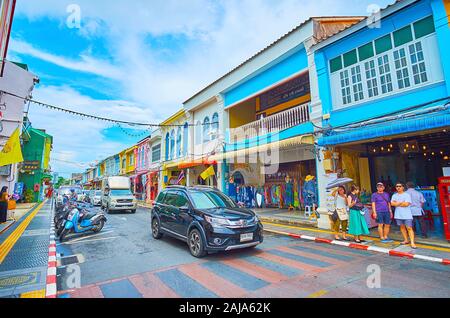 PHUKET, THAILAND - APRIL 30, 2019: Thalang Road is the central thoroughfare of Old Town, lined with preserved Peranakan townhouses, serving as hotels, Stock Photo
