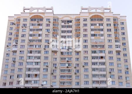 Multystoried houses. House in a residential area of Moscow. Ugly air conditioners on the facade of the house. Stock Photo