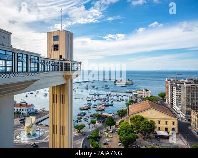 Architectural landmark Lacerda Lift and Bay of All Saints (Portuguese: Baia de Todos os Santos) on a sunny day in Salvador da Bahia, Brazil. Stock Photo