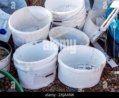 Old paint bucket renovation apartment Stock Photo
