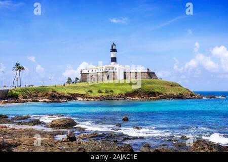 View of the famous Farol da Barra Lighthouse in Salvador da Bahia, Brazil. Dating from the year 1698, it is said to be the oldest lighthouse in South Stock Photo