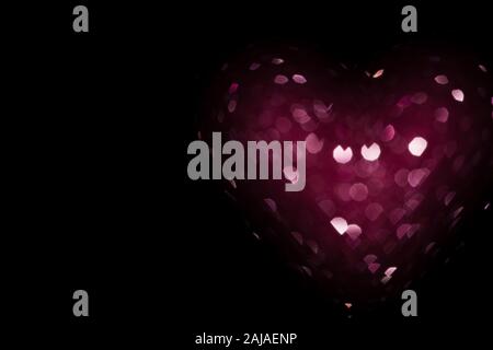 pink heart on black background, valentines day party background with pink bokeh heart Stock Photo