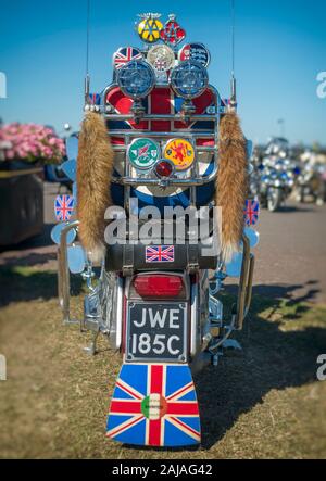 Rear View of a Lambretta Scooter with Badges and Lights Stock Photo