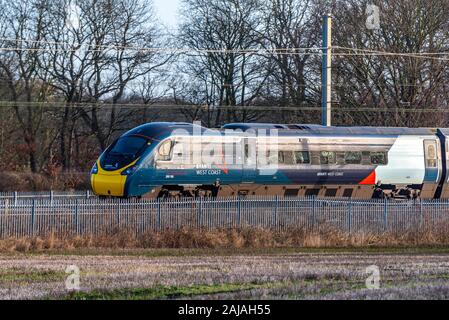 Avanti Pendolino class 390 in new livery on the West Coast Main Line. Stock Photo