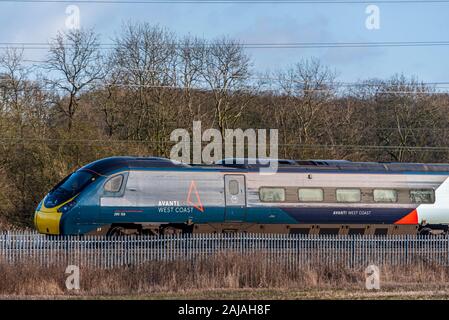 Avanti Pendolino class 390 in new livery on the West Coast Main Line. Stock Photo
