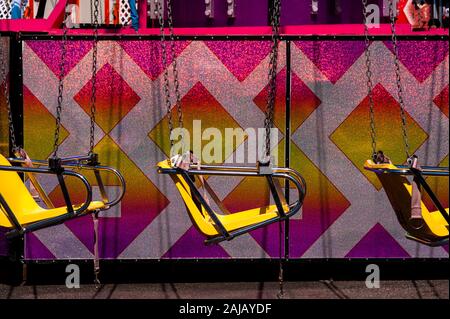 Evergreen State Fair with swing ride close-up on a summer day Stock Photo