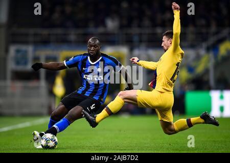 Milan, Italy - 10 December, 2019: Romelu Lukaku (L) of FC Internazionale is tackle by Clement Lenglet of FC Barcelona during the UEFA Champions League football match between FC Internazionale and FC Barcelona. FC Barcelona won 2-1 over FC Internazionale. Credit: Nicolò Campo/Alamy Live News Stock Photo