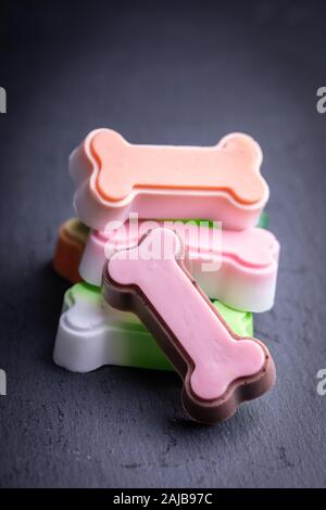 Cute colored bones on dark dark background Stock Photo