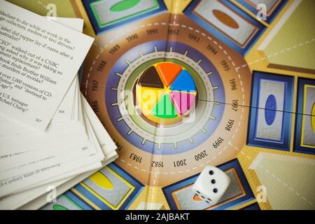 Woodbridge, NJ - January 3, 2020: A closeup view of the classic family board game, Trivial Pursuit. This particular version is the 20th Anniversary Ed Stock Photo
