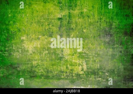 Real wall background with grungy, fluorescent green texture. Stock Photo