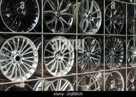 Car rims in shopping window display Stock Photo