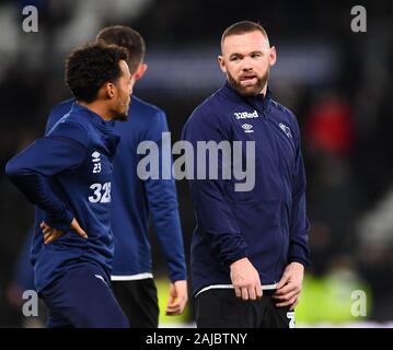 DERBY, ENGLAND - JANUARY 2ND Duane Holmes (23) of Derby County talks with Wayne Rooney (32) of Derby County during the Sky Bet Championship match between Derby County and Barnsley at the Pride Park, Derby on Thursday 2nd January 2020. (Credit: Jon Hobley | MI News) Photograph may only be used for newspaper and/or magazine editorial purposes, license required for commercial use Credit: MI News & Sport /Alamy Live News Stock Photo