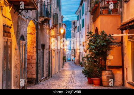 Terracina, Italy. Night Evening View Of Old Street In Illuminations. Stock Photo