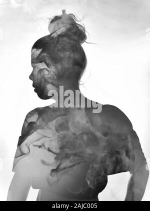 Double exposure portrait of woman and smoke Stock Photo - Alamy