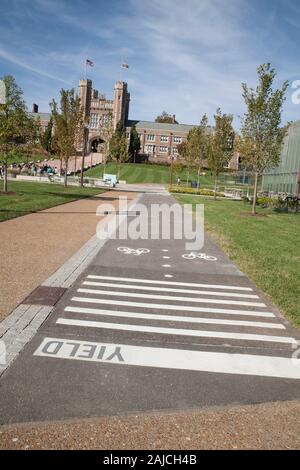 Bicycle and walkway with view of Brookings Hall at Washington University in St Louis, Missouri. Stock Photo