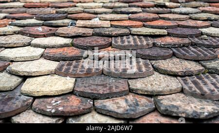 ceramic roof tiles on an old roof, Geneva, Switzerland - image Stock Photo