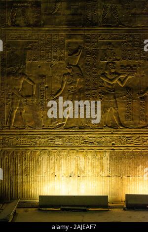 enlightened hieroglyphs Inside the sanctuary at the centre of the egyptian Temple of Horus at Edfu, in Egypt. Stock Photo