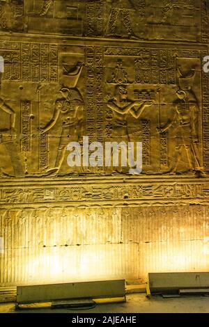 enlightened hieroglyphs Inside the sanctuary at the centre of the egyptian Temple of Horus at Edfu, in Egypt. Stock Photo