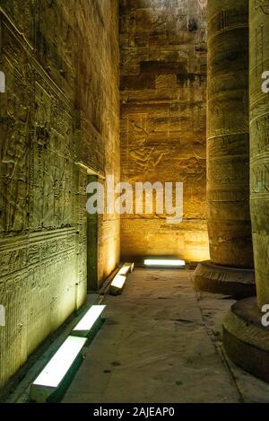 enlightened hieroglyphs Inside the sanctuary at the centre of the egyptian Temple of Horus at Edfu, in Egypt. Stock Photo