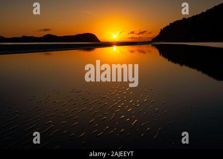 Sunrise over the ocean at Cape Hillsborough. Stock Photo