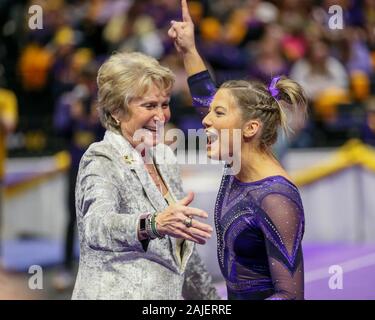 Baton Rouge, LA, USA. 3rd Jan, 2020. LSU's Olivia Gunter celebrates her  floor routine with Head Coach D-D Breaux during NCAA Gymnastics action  between the Arizona Wildcats and the LSU Tigers at