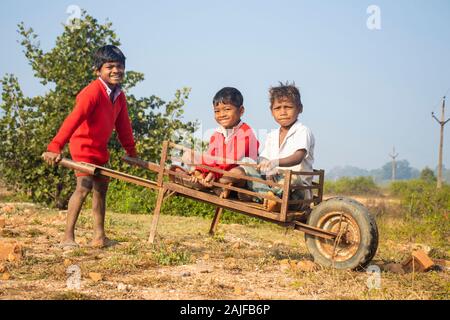 Sijhora / India / October 28, 2019 - Happy Indian rural children playing smiling. Stock Photo