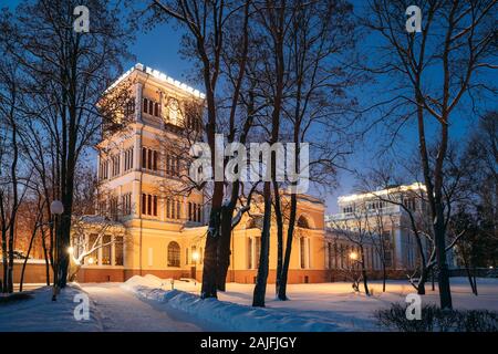 Gomel, Belarus. City Park In Winter Night. Rumyantsevs And Paskeviches Palace In Homiel Park, Belarus. Famous Local Landmark In Snow. Stock Photo