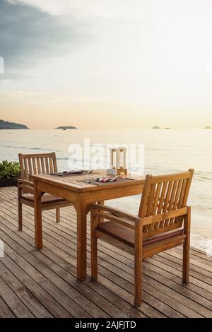Outdoor beach сafe at sunset on tropical island Stock Photo