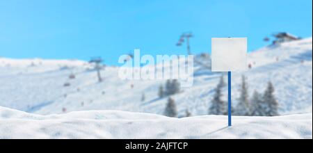 Blank ski signost on ski resort mockup. Ski lifts and slopes in background Stock Photo