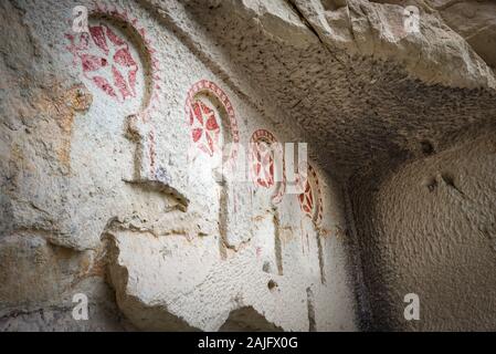 A row of Maltese crosses decorating the wall of an early Christian church in Goreme Open Air Museum (UNESCO heritage site) in Cappadocia, Turkey Stock Photo