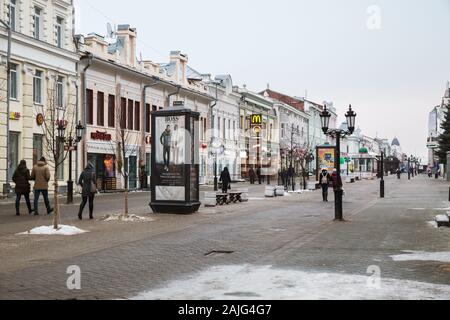 KAZAN, RUSSIA - JANUARY 03, 2018: Bauman street, the main pedestrian tourist street in the center of Kazan, on a winter cloudy day Stock Photo