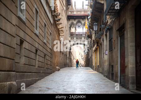 Tourist sightseeing in Barcelona Barri Gothic Quarter and Bridge of Sighs in Barcelona, Catalonia, Spain. Europe tourism, history building, or traditi Stock Photo