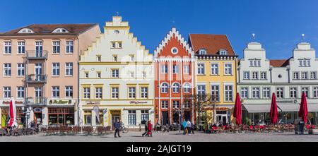 Panorama of colorful facades at the central market square of Greifswald, Germany Stock Photo