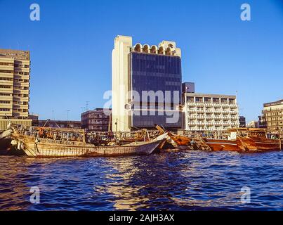 Dubai Creek waterway life and soul of this famous city and worldwide tourist destination with numerous dhows tied up on the quayside from India, Iran and Africa Stock Photo