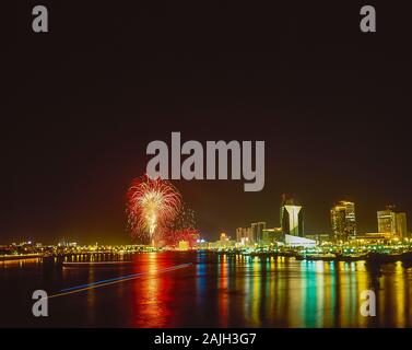 Firework displays on Dubai Creek waterway life and soul of this famous city and worldwide tourist destination on UAE National Day Stock Photo