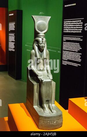 Photo taken during the opening visit of the exhibition “Osiris, Egypt's Sunken Mysteries”. statue of the goddess Isis, grauwacke. Stock Photo